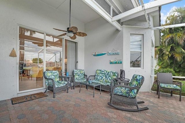 view of patio / terrace with ceiling fan and an outdoor hangout area