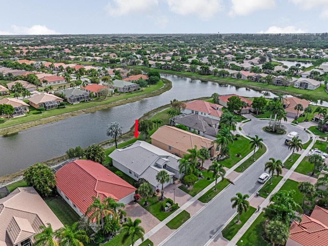 aerial view with a water view and a residential view