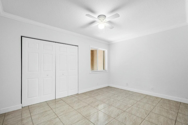 865 Gazetta Way, West Palm Beach, FL 33413 - unfurnished bedroom with baseboards, ornamental molding, a ceiling fan, and a closet