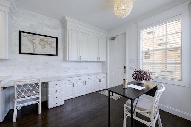office area featuring baseboards and dark wood finished floors