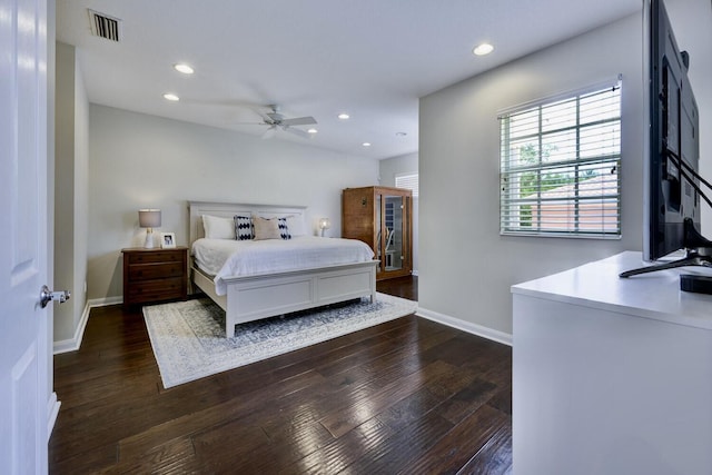 bedroom with dark wood-style flooring, baseboards, visible vents, and recessed lighting