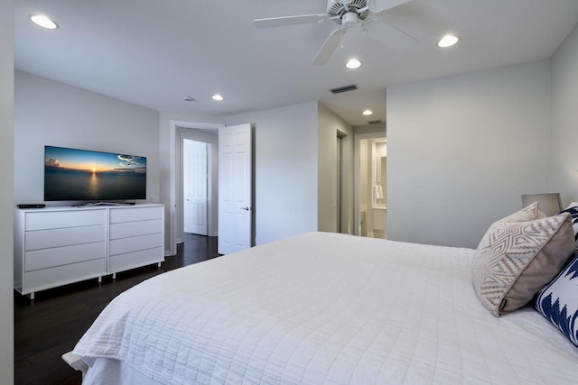 bedroom featuring ceiling fan, ensuite bath, recessed lighting, visible vents, and dark wood-style floors