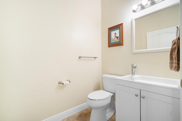 4732 SE Starling Cir, Stuart, FL 34997 - bathroom featuring baseboards, toilet, and vanity