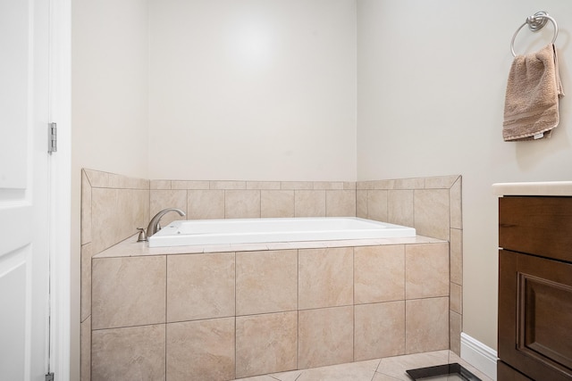 4732 SE Starling Cir, Stuart, FL 34997 - bathroom with tile patterned floors, a garden tub, and vanity