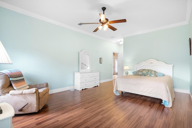 4732 SE Starling Cir, Stuart, FL 34997 - bedroom with baseboards, wood finished floors, a ceiling fan, and crown molding