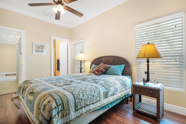4732 SE Starling Cir, Stuart, FL 34997 - bedroom with visible vents, baseboards, ornamental molding, wood finished floors, and a ceiling fan