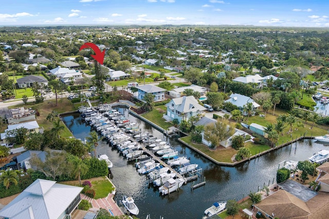 4732 SE Starling Cir, Stuart, FL 34997 - drone / aerial view with a water view