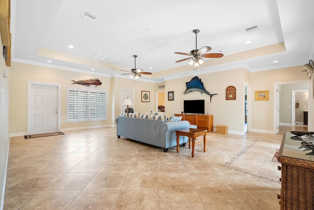 4732 SE Starling Cir, Stuart, FL 34997 - living room featuring a ceiling fan, visible vents, and a tray ceiling