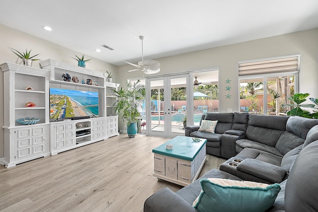 living area featuring ceiling fan, light wood-style floors, french doors, recessed lighting, and visible vents