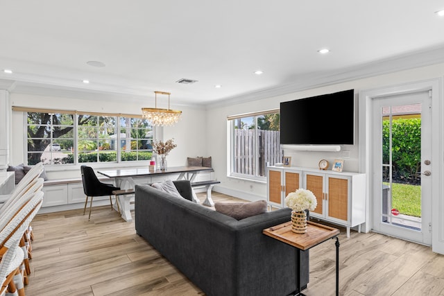 912 Roberts Rd, Delray Beach, FL 33483 - living room featuring ornamental molding, light wood-type flooring, recessed lighting, and a healthy amount of sunlight