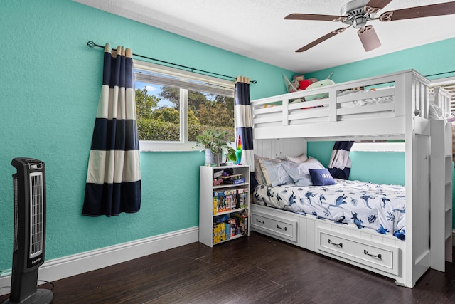 912 Roberts Rd, Delray Beach, FL 33483 - bedroom with ceiling fan, a textured wall, wood finished floors, and baseboards