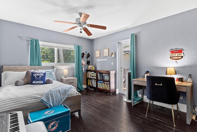 912 Roberts Rd, Delray Beach, FL 33483 - bedroom with hardwood / wood-style flooring, a ceiling fan, and a textured wall