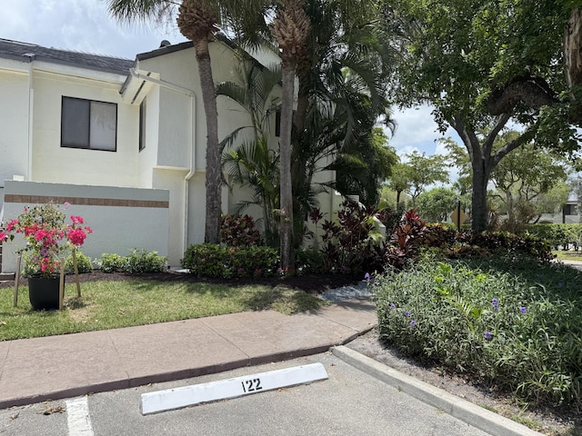 7458 Victory Ln Unit 10103, Delray Beach, FL 33446 - view of front of house featuring uncovered parking