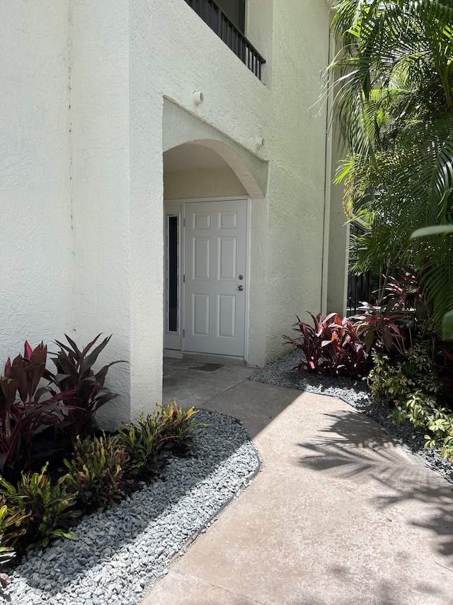 7458 Victory Ln Unit 10103, Delray Beach, FL 33446 - property entrance featuring stucco siding