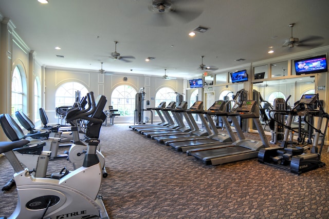 exercise room with recessed lighting, a ceiling fan, crown molding, and carpet floors