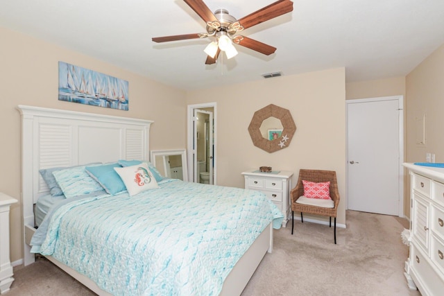 13 Lake Vista Trl Unit 202, Port Saint Lucie, FL 34952 - bedroom with visible vents, ceiling fan, and light carpet