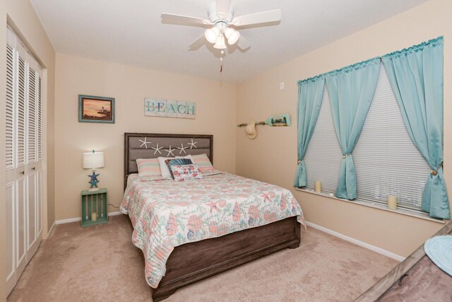 13 Lake Vista Trl Unit 202, Port Saint Lucie, FL 34952 - carpeted bedroom featuring baseboards, ceiling fan, and a closet