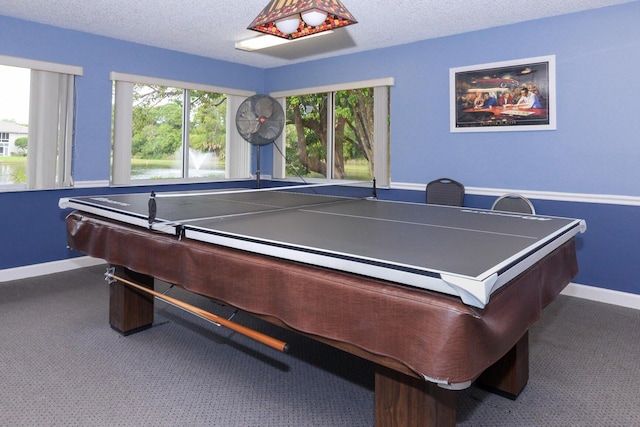 13 Lake Vista Trl Unit 202, Port Saint Lucie, FL 34952 - playroom with baseboards, a textured ceiling, and carpet