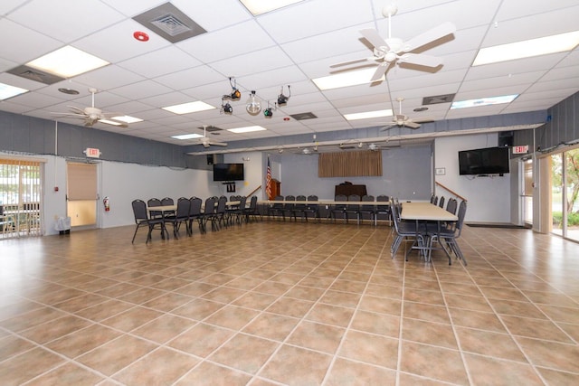 13 Lake Vista Trl Unit 202, Port Saint Lucie, FL 34952 - miscellaneous room featuring visible vents, a ceiling fan, tile patterned flooring, and a paneled ceiling