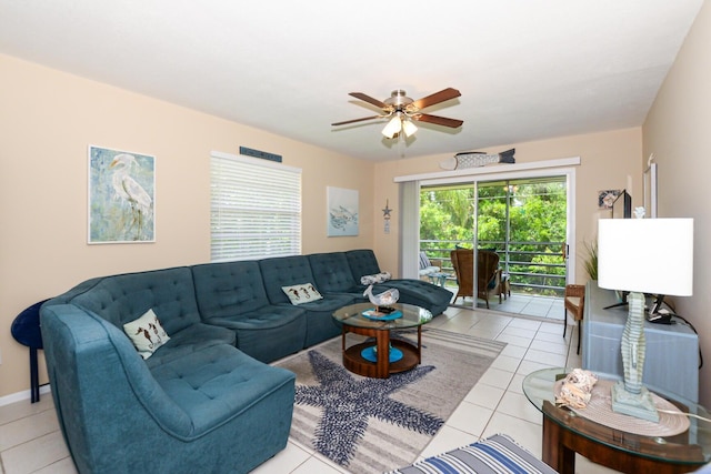 13 Lake Vista Trl Unit 202, Port Saint Lucie, FL 34952 - living area featuring baseboards, light tile patterned floors, and ceiling fan