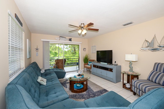 13 Lake Vista Trl Unit 202, Port Saint Lucie, FL 34952 - living room featuring visible vents, light tile patterned floors, and ceiling fan
