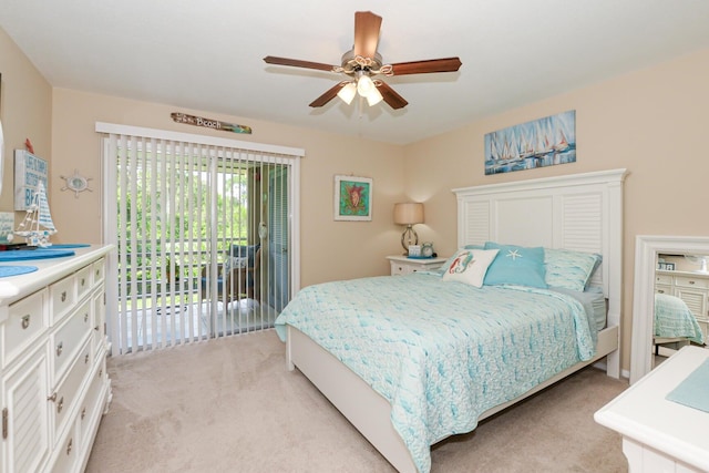 13 Lake Vista Trl Unit 202, Port Saint Lucie, FL 34952 - bedroom featuring a ceiling fan, access to outside, and light carpet