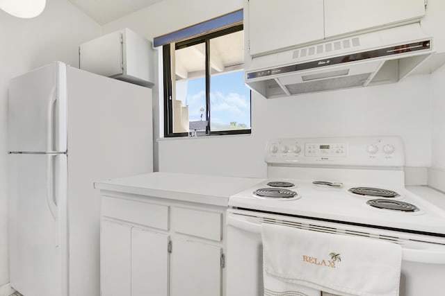 901 Club Dr, Palm Beach Gardens, FL 33418 - kitchen featuring light countertops, white cabinetry, under cabinet range hood, and white appliances