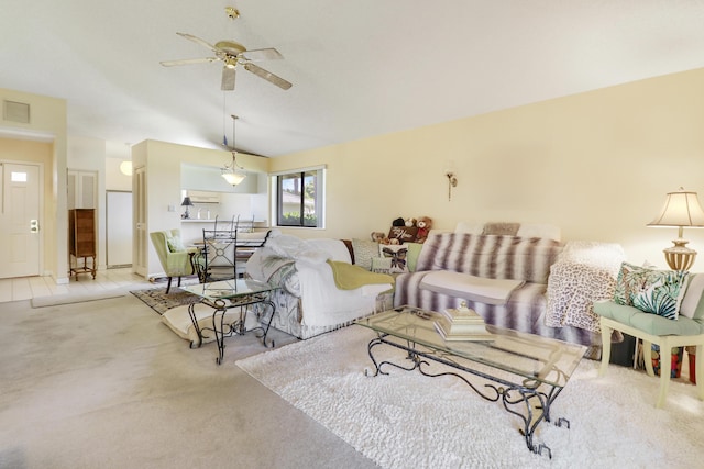 901 Club Dr, Palm Beach Gardens, FL 33418 - carpeted living area with a ceiling fan, vaulted ceiling, and visible vents