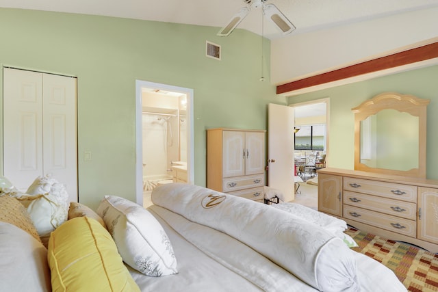 901 Club Dr, Palm Beach Gardens, FL 33418 - bedroom with ensuite bath, high vaulted ceiling, a ceiling fan, visible vents, and a closet