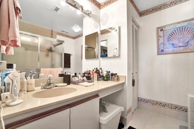 136 Centennial Ct, Deerfield Beach, FL 33442 - full bath featuring visible vents, vanity, tile patterned flooring, and a shower stall