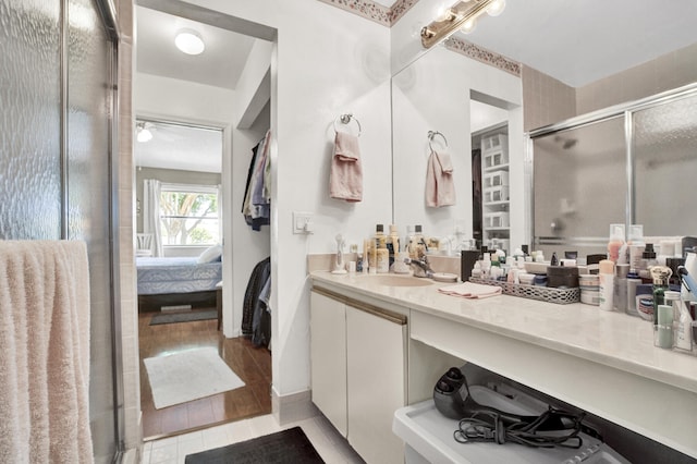 136 Centennial Ct, Deerfield Beach, FL 33442 - ensuite bathroom featuring vanity, a stall shower, and ensuite bathroom