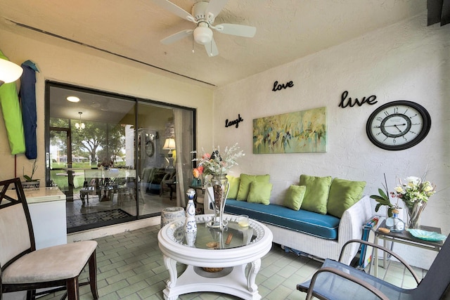 136 Centennial Ct, Deerfield Beach, FL 33442 - living room with a textured wall and ceiling fan
