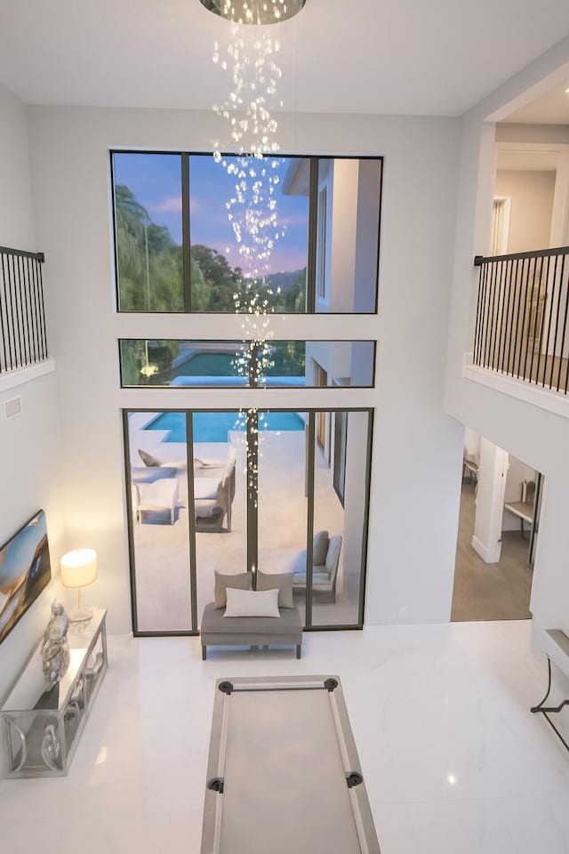 7015 NW 27th Ave, Boca Raton, FL 33496 - dining area with a chandelier and plenty of natural light