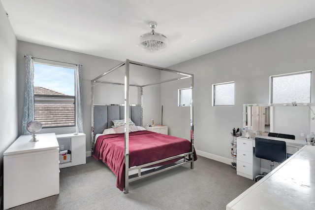 7015 NW 27th Ave, Boca Raton, FL 33496 - carpeted bedroom featuring baseboards