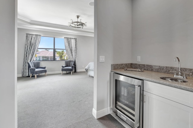 7015 NW 27th Ave, Boca Raton, FL 33496 - bar with an inviting chandelier, ornamental molding, bar, a sink, and wine cooler