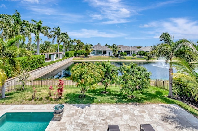 7015 NW 27th Ave, Boca Raton, FL 33496 - view of pool featuring fence, a yard, and a water view