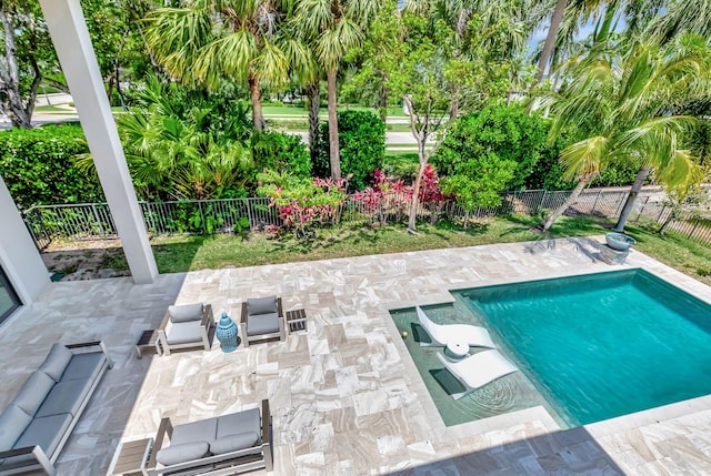 7015 NW 27th Ave, Boca Raton, FL 33496 - view of pool with a patio, a fenced backyard, and a fenced in pool