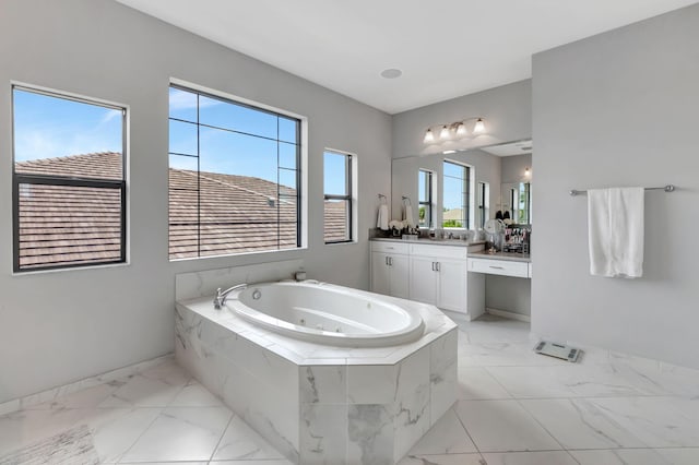 7015 NW 27th Ave, Boca Raton, FL 33496 - full bath featuring a tub with jets, a healthy amount of sunlight, vanity, and marble finish floor