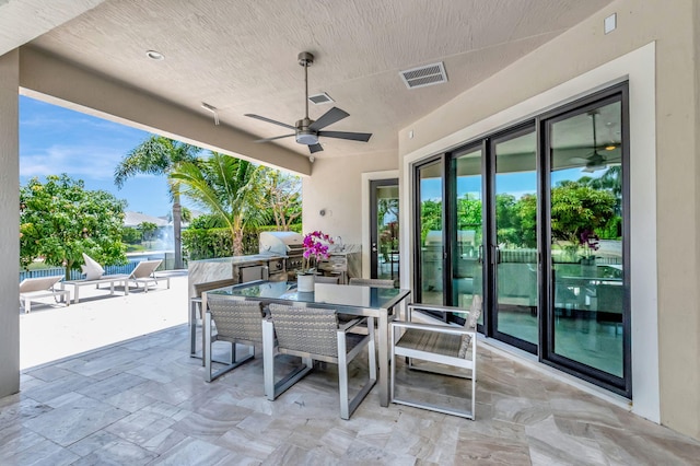 7015 NW 27th Ave, Boca Raton, FL 33496 - view of patio with visible vents, outdoor dining space, grilling area, and a ceiling fan