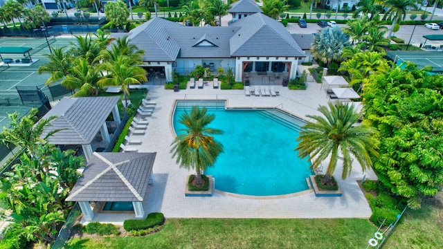 7015 NW 27th Ave, Boca Raton, FL 33496 - community pool with fence, a gazebo, and a patio