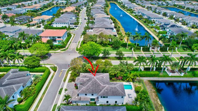 7015 NW 27th Ave, Boca Raton, FL 33496 - drone / aerial view featuring a residential view and a water view