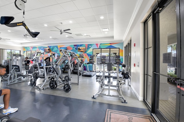 7015 NW 27th Ave, Boca Raton, FL 33496 - exercise room with ceiling fan, baseboards, a drop ceiling, and plenty of natural light