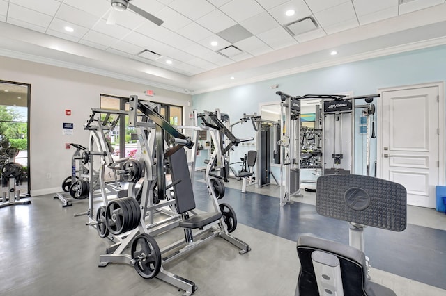 7015 NW 27th Ave, Boca Raton, FL 33496 - exercise room featuring crown molding, a ceiling fan, visible vents, baseboards, and a drop ceiling
