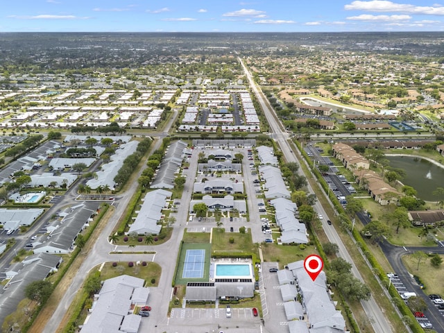 aerial view with a water view and a residential view