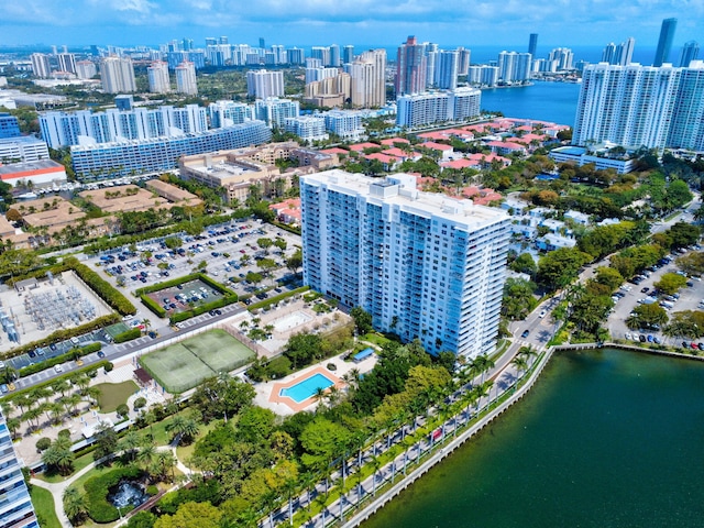 bird's eye view featuring a view of city and a water view