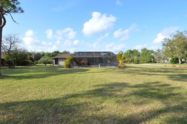 view of yard featuring a lanai