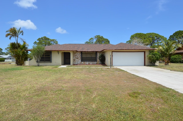single story home with a garage, driveway, a front lawn, and stucco siding