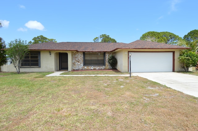ranch-style home with concrete driveway, an attached garage, a front lawn, and stucco siding
