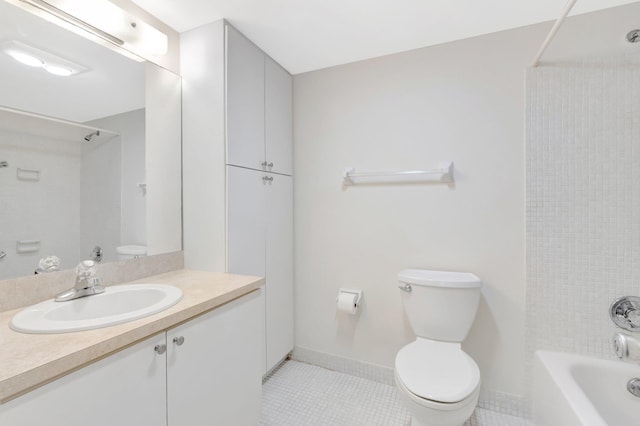 full bath with shower / tub combination, tile patterned flooring, vanity, toilet, and baseboards