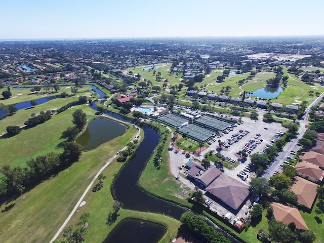 birds eye view of property with a water view and a residential view